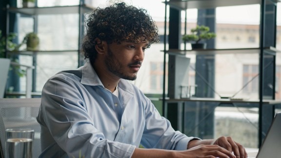 young-man-working-on-laptop-in-office-2026-01-09-06-36-04-utc-1